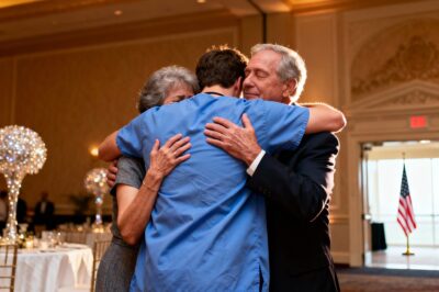 He walked through a room full of judgment to find the only two people whose opinion ever truly mattered.