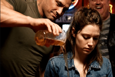 He Spilled Beer on a “Tired Nurse” to Impress His Team, Unaware He Was Mocking the Only Woman to Ever Survive Delta Force Selection. When the Admiral Walked In and Kneeled Before Her, the Entire Bar Went Silent.