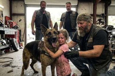In rural Tennessee, a muddy German Shepherd burst into our Biker Clubhouse carrying a trembling 7-year-old girl, begging us to save her mama from a brutal atack.**