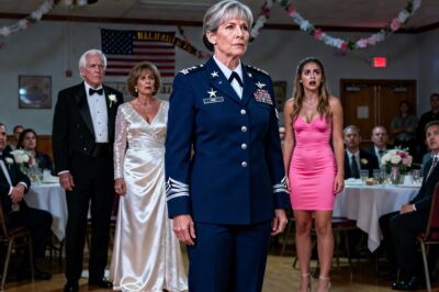 In a room full of whispers and cheap perfume, a father’s public cruelty threatened to erase a lifetime of accomplishment with a single, brutal word. But he forgot one thing: honor isn’t given, it’s earned—and she wore hers.