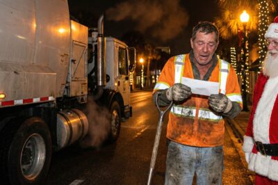 He spends his days hauling trash and his nights holding his sick wife’s hand in a small Sarasota apartment, but a “Secret Santa” shock leaves this essential worker speechless and trembling on national TV