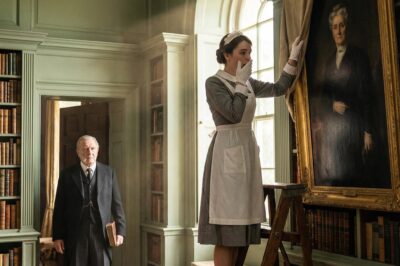 I cleaned a billionaire’s mansion in the Hollywood Hills to pay my late mother’s debts, but my heart stopped when I lifted a forbidden sheet and saw HER face painted on his wall.