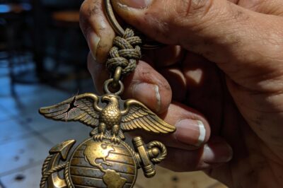 His dog tag was buried with him three years ago in the sand. But the girl held it now, its unique, jagged scratch cold against my thumb.