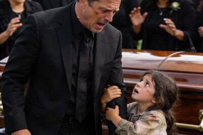 I was standing right there in front of 200 people, about to say my final goodbye to the love of my life. The grief was so heavy I could barely breathe. Then, out of nowhere, this tiny, disheveled little girl comes sprinting through the cemetery, dodging security like a running back. She grabbed my arm, looked me dead in the eye, and screamed something that made the entire world stop spinning. I thought I was losing my mind.