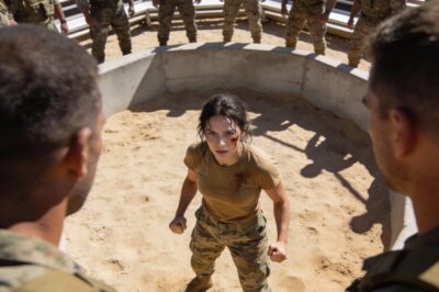 They told me it was just “advanced conditioning.” But when you’re standing in a sandpit with twelve men circling you like wolves, and your commanding officer is smiling from the bleachers, you know it’s not training. It’s a hunt. I had fractured ribs before the first punch was even thrown, but I refused to cry. I refused to give him the satisfaction. He thought he was breaking a “princess.” He didn’t realize he was forging a weapon that would end his entire career in less than twenty minutes.