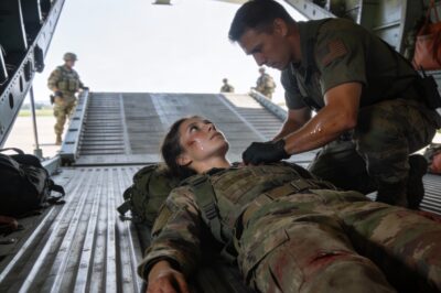 I’m bleeding out while my commander jokes about the paperwork.