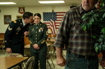 I was just supposed to watch. That was the promise I made to her dying father in the cab of my truck three years ago. “Just make sure she knows she has family, Jack.” That’s all I had to do. Stand in the back of the banquet hall in my old Wranglers, looking like a stain on their polished military world, and witness her big moment. But when I saw the fear in her eyes—real, raw terror directed at the officer looming over her—the old instincts woke up. The ones I thought I buried a lifetime ago under miles of asphalt.