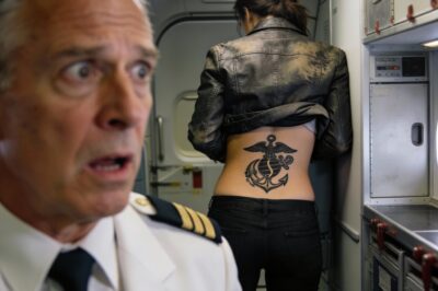 They threw me out of my first-class seat because of my worn jeans and old jacket, laughing as they forced me to do the ‘walk of shame.’ They thought I was nobody, but their laughter died when my jacket rode up, and the pilot saw the Navy SEAL trident tattooed on my back.
